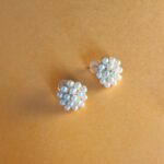cluster pearl like earrings, enamel beads, set in a dome shape.