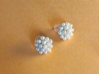 cluster pearl like earrings, enamel beads, set in a dome shape.
