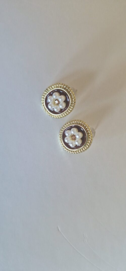 Two flower pearl gold plated earrings with pearl detail on a white background