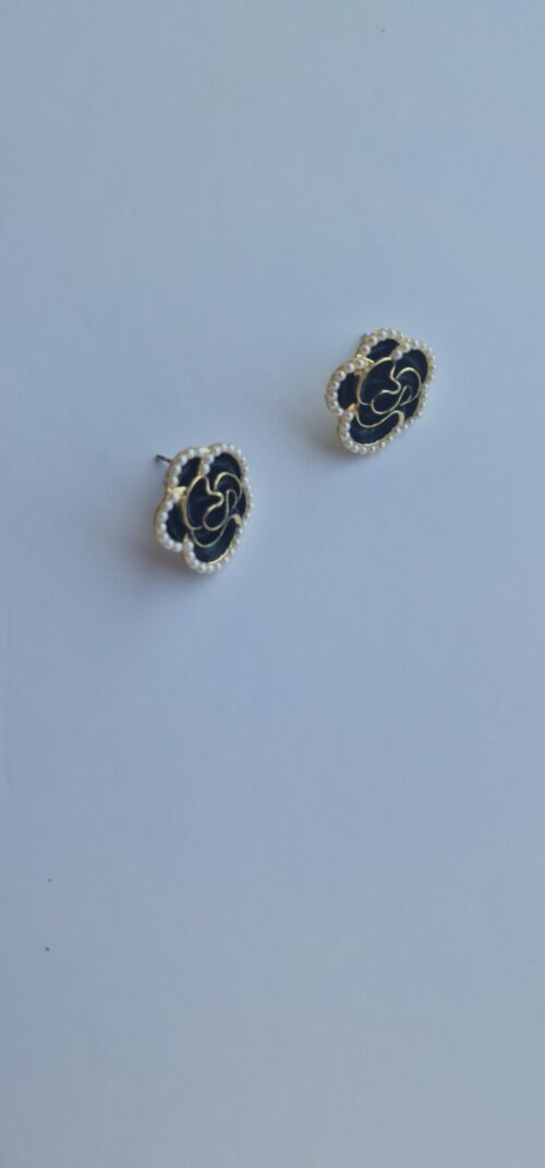 Black burgundy gold rose earrings with pearl detail on a white background.