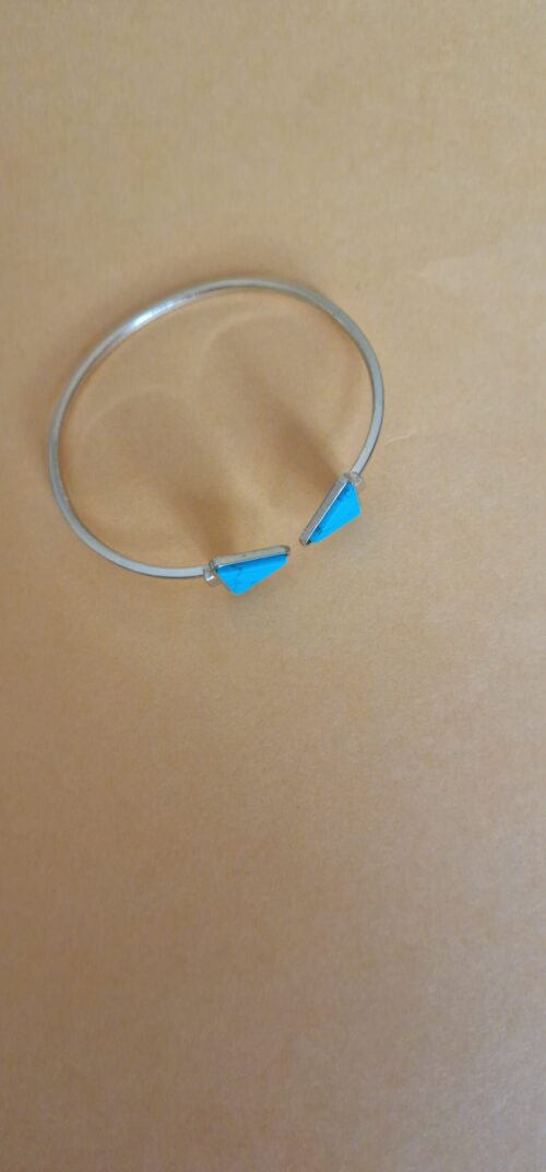Marble Gold bracelet on a orange background.