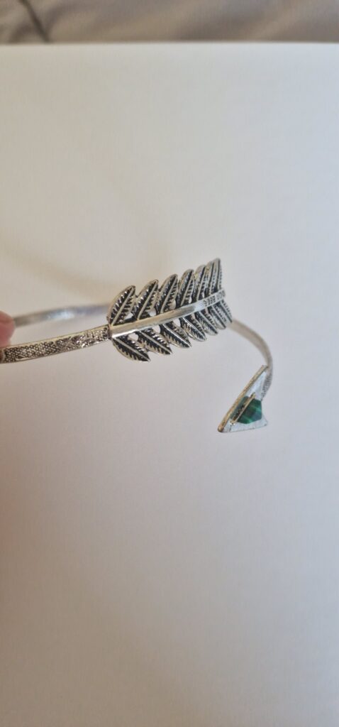 Silver Feather and Arrow Armband (Don Bell) on a white background.
