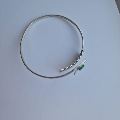 Silver Feather and Arrow Armband (Don Bell) on a white background.